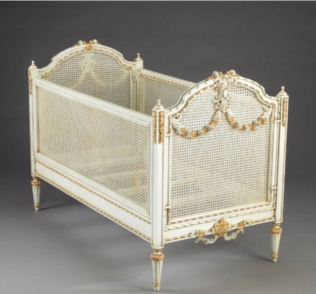 Vintage rattan cot